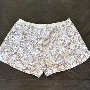 White High waisted shorts, pleated front, trouser style, professional, classic